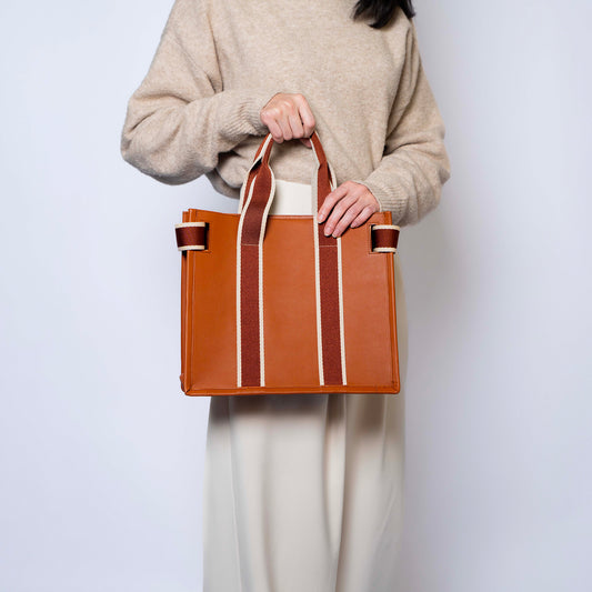 NUMÉRO 01 by atelier &LAB — rear view revealing a bold, architectural volume in premium upcycled full-grain calf leather, Paris.