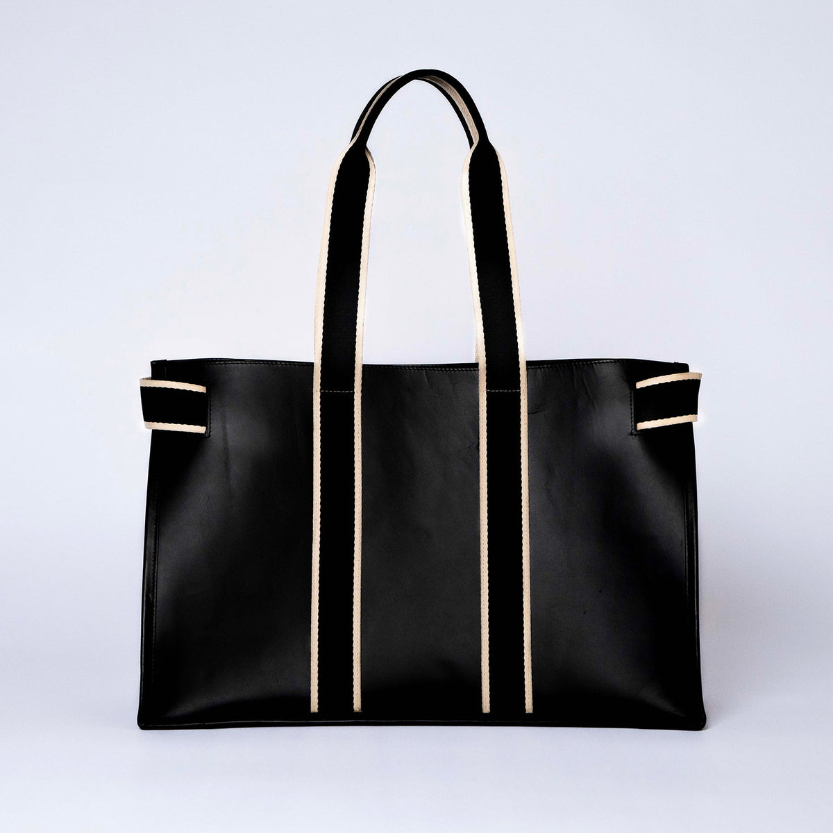 Structured leather tote bag — NUMÉRO 01 L by atelier &LAB, rear view showing clean structured silhouette