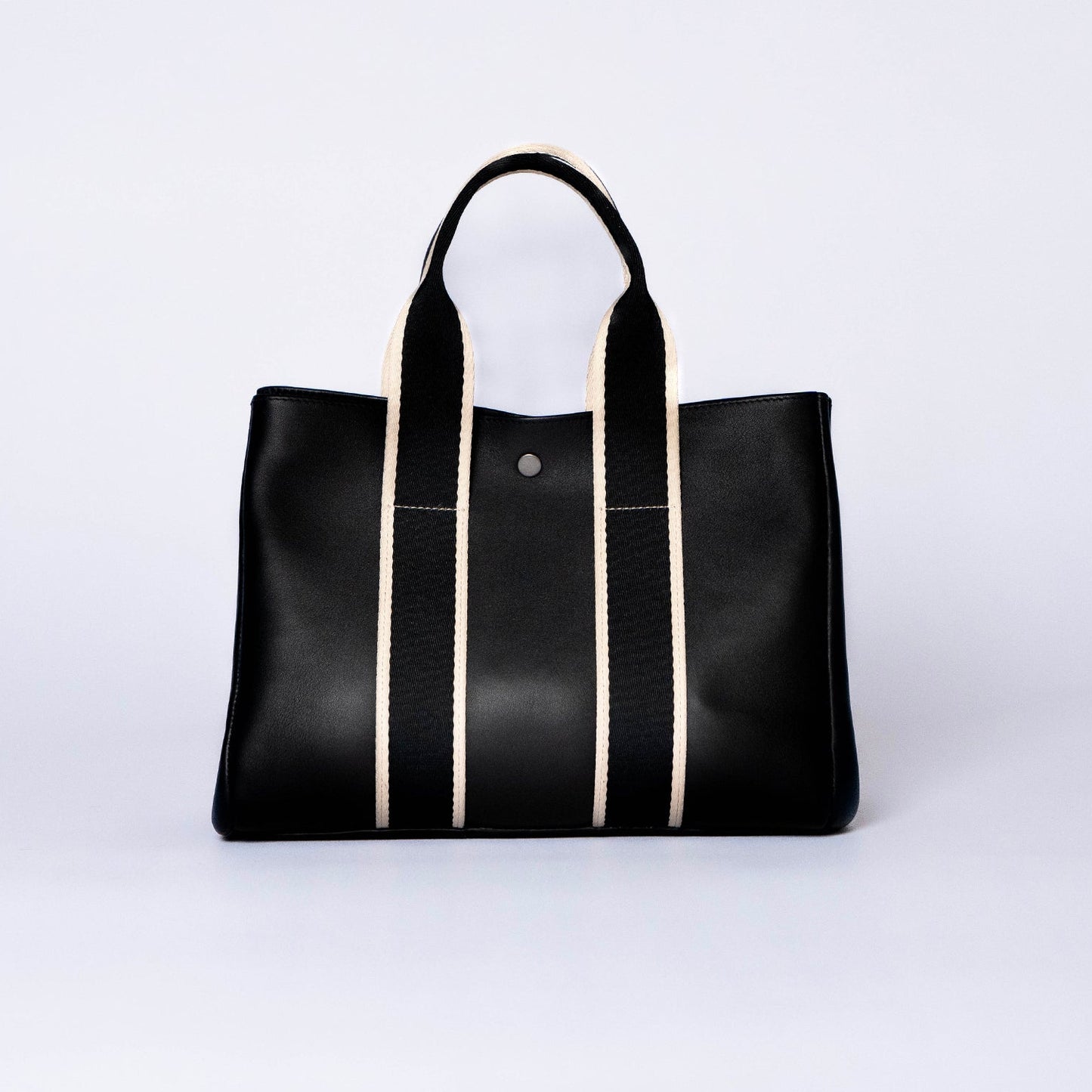 Everyday leather tote bag — NUMÉRO 03 by atelier &LAB, black upcycled full-grain calf leather, rear view showing an open shape and easy access for daily use.