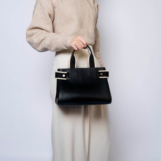 NUMÉRO 04 by atelier &LAB — frontal perspective on a refined, minimalist volume with calm, architectural presence in premium upcycled full-grain calf leather, Paris.