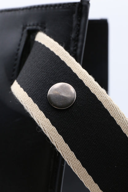 NUMÉRO 00 by atelier &LAB — construction detail expressing a Raw, Architectural Tension in Premium upcycled full-grain calf leather, Paris.