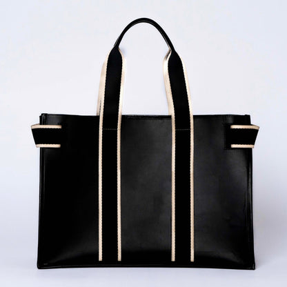 Structured leather tote bag — NUMÉRO 01 by atelier &LAB, rear view highlighting the clean structured silhouette and balanced proportions in premium upcycled full-grain calf leather, Paris design studio.
