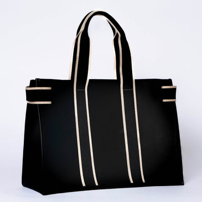 Structured leather tote bag — NUMÉRO 01 by atelier &LAB, rear three-quarter view highlighting the architectural structure and balanced proportions in premium upcycled full-grain calf leather, Paris design studio.