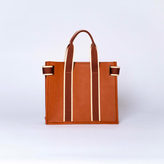 NUMÉRO 01 by atelier &LAB — rear angle expressing a calm, refined volume and understated architectural presence in premium upcycled full-grain calf leather, Paris.