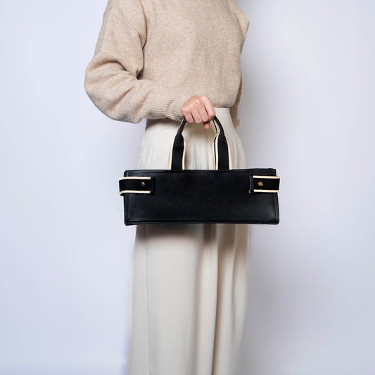 NUMÉRO 02 by atelier &LAB — frontal perspective expressing a refined, flat architectural volume in premium upcycled full-grain calf leather, Paris.