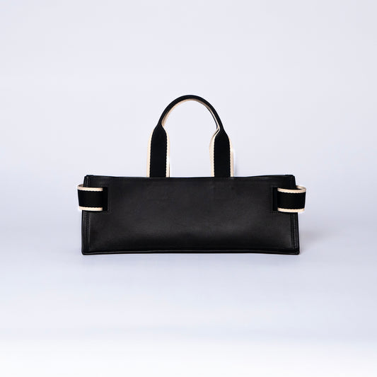 NUMÉRO 02 by atelier &LAB — Large flat tote bag in black. Structured horizontal silhouette, rear view. Premium upcycled full-grain calf leather, brutalist aesthetic, Paris.