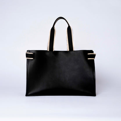 NUMÉRO 02 by atelier &LAB — rear view revealing a monumental, composed volume in premium upcycled full-grain calf leather, Paris.