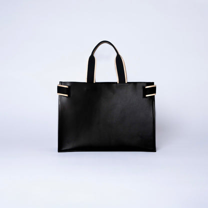 Minimal structured leather tote bag — NUMÉRO 02 by atelier &LAB, black upcycled full-grain calf leather, rear view showing a clean structured silhouette.