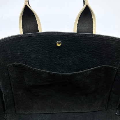 Everyday leather tote bag — NUMÉRO 03 by atelier &LAB, black upcycled full-grain calf leather, interior front view showing a central pocket and easy access for daily essentials.
