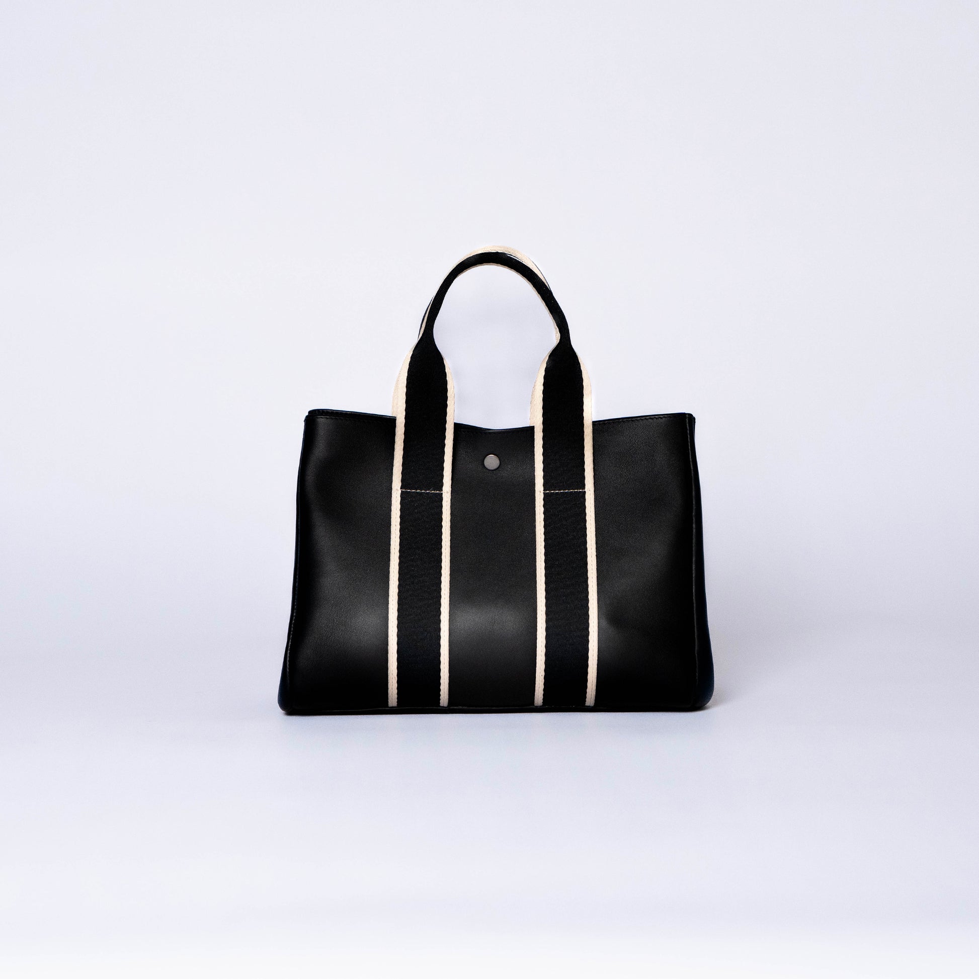 Everyday leather tote bag — NUMÉRO 03 by atelier &LAB, black upcycled full-grain calf leather, rear view showing an open shape and easy access for daily use.