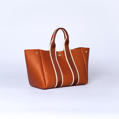 Everyday leather tote bag — NUMÉRO 03 by atelier &LAB, cognac upcycled full-grain calf leather, front three-quarter view showing an open, easy-access design for daily use.