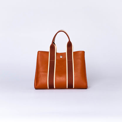 NUMÉRO 03 by atelier &LAB — rear view expressing a calm, sculptural presence with balanced proportions in premium upcycled full-grain calf leather, Paris.