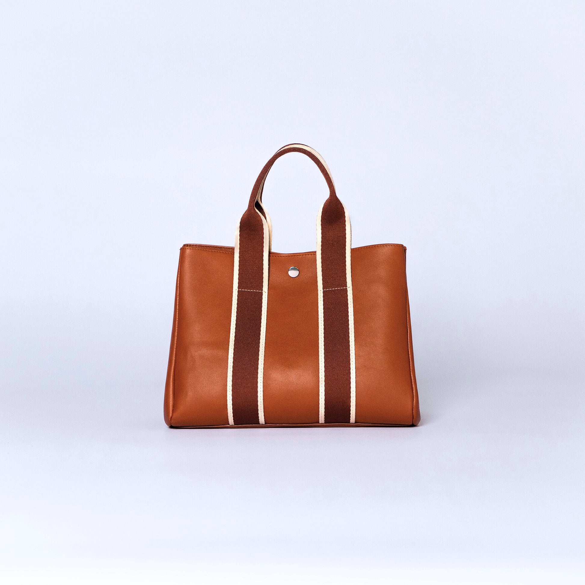 Everyday leather tote bag — NUMÉRO 03 by atelier &LAB, cognac upcycled full-grain calf leather, rear view showing an open shape and easy access for daily essentials.