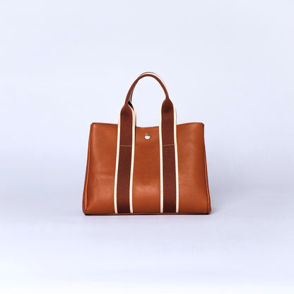 Everyday leather tote bag — NUMÉRO 03 by atelier &LAB, cognac upcycled full-grain calf leather, rear view showing an open shape and easy access for daily essentials.