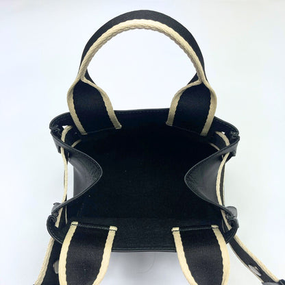 Mini leather handbag interior in black — NUMÉRO 04 by atelier &LAB, open compartment, compact construction