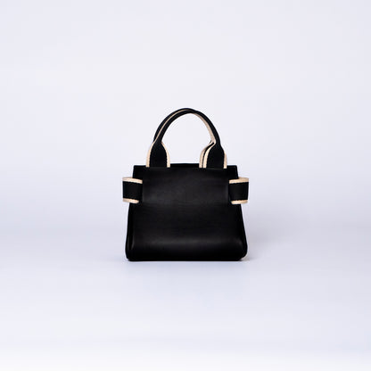 NUMÉRO 04 mini by atelier &LAB — rear view revealing a compact, essential architectural volume with refined quiet luxury in premium upcycled full-grain calf leather, Paris.