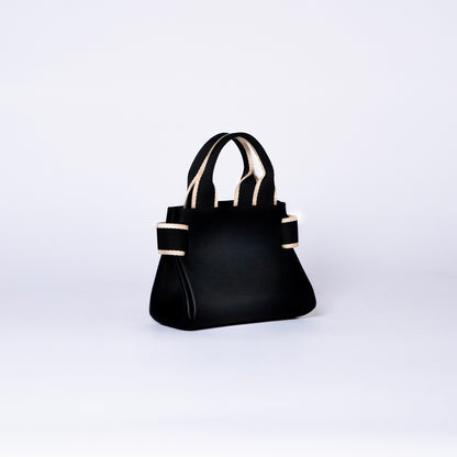 NUMÉRO 04 mini by atelier &LAB — rear three-quarter view highlighting a precise, compact silhouette with sculptural restraint in premium upcycled full-grain calf leather, Paris.