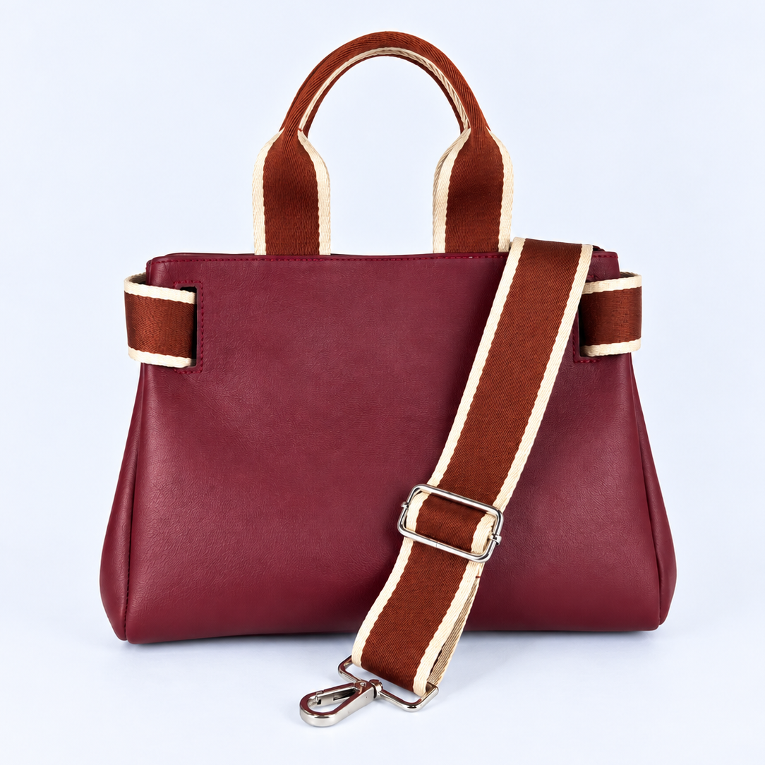 Front view of the NO04 M handbag in Bordeaux upcycled calf leather by Hiroki AMANO — atelier &LAB, with a detachable, adjustable woven shoulder strap in rust and ecru. Designed and made near Paris.