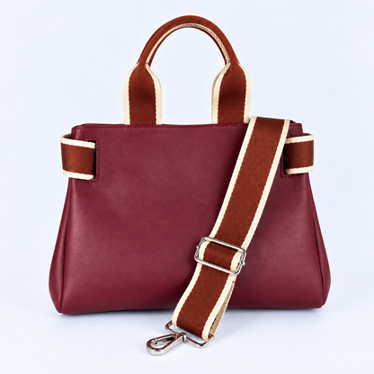 Front view of the NO04 M handbag in Bordeaux upcycled calf leather by Hiroki AMANO — atelier &LAB, with a detachable, adjustable woven shoulder strap in rust and ecru. Designed and made near Paris.